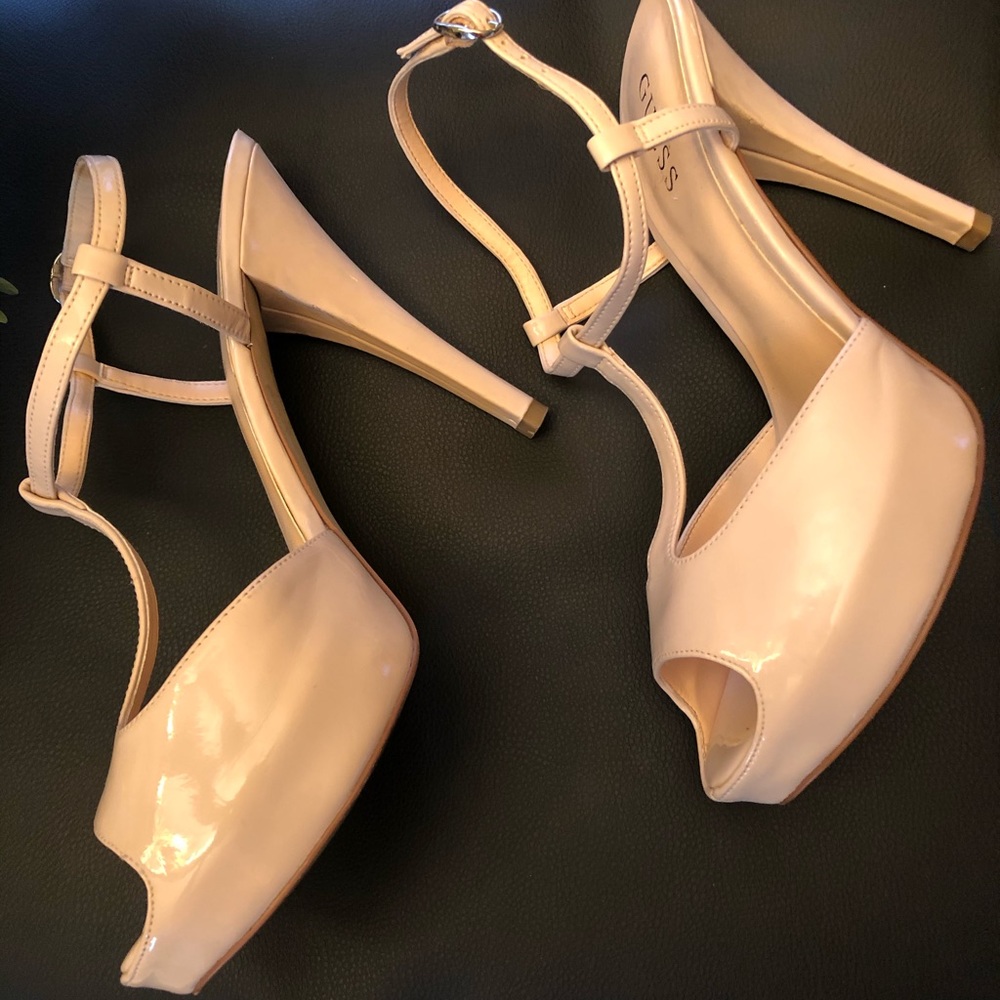 Guess Size 9 cream, platform heel. Like new.